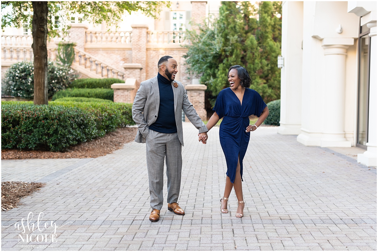 black couple walking and smiling