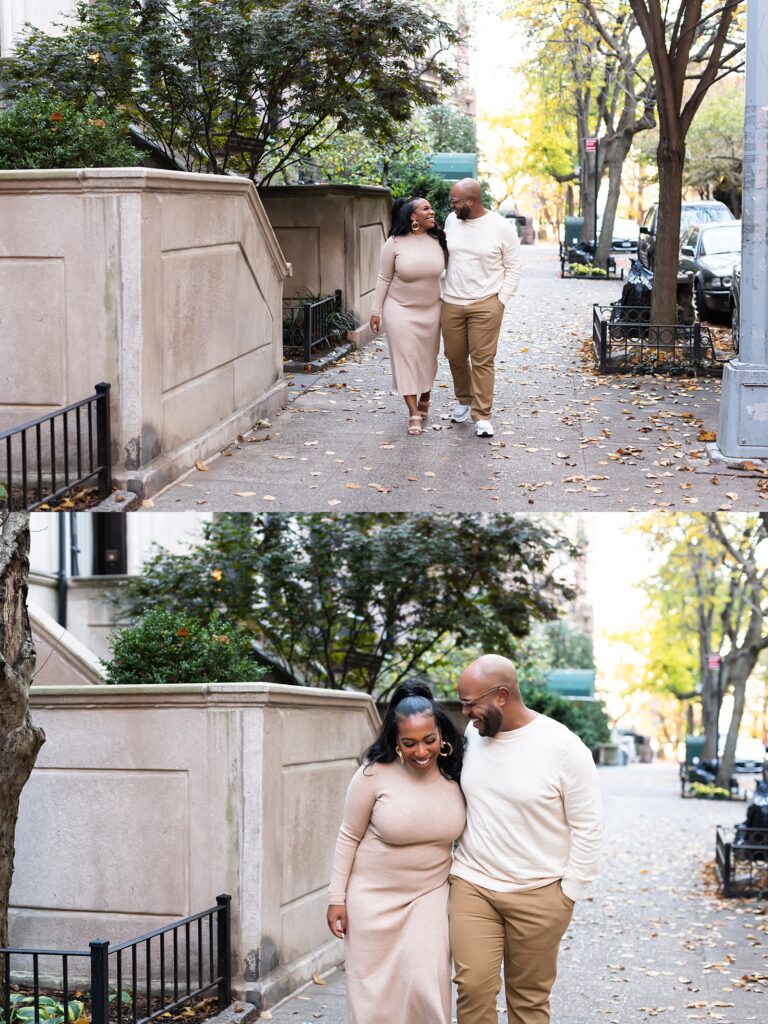 African american couple walking through Brooklyn brownstone neighborhood smiling
